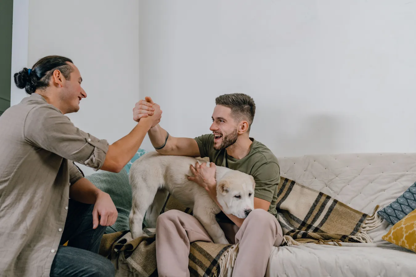 Two adults sharing a warm moment at home.